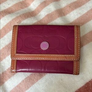 Coach pink card case.